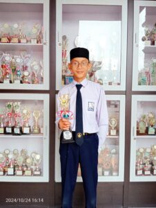 Adzaki Awi Fadhiliano dari SMP IT Al-Kautsar Raih Juara 2 Lomba Tartil di BELADING EXPO 2024